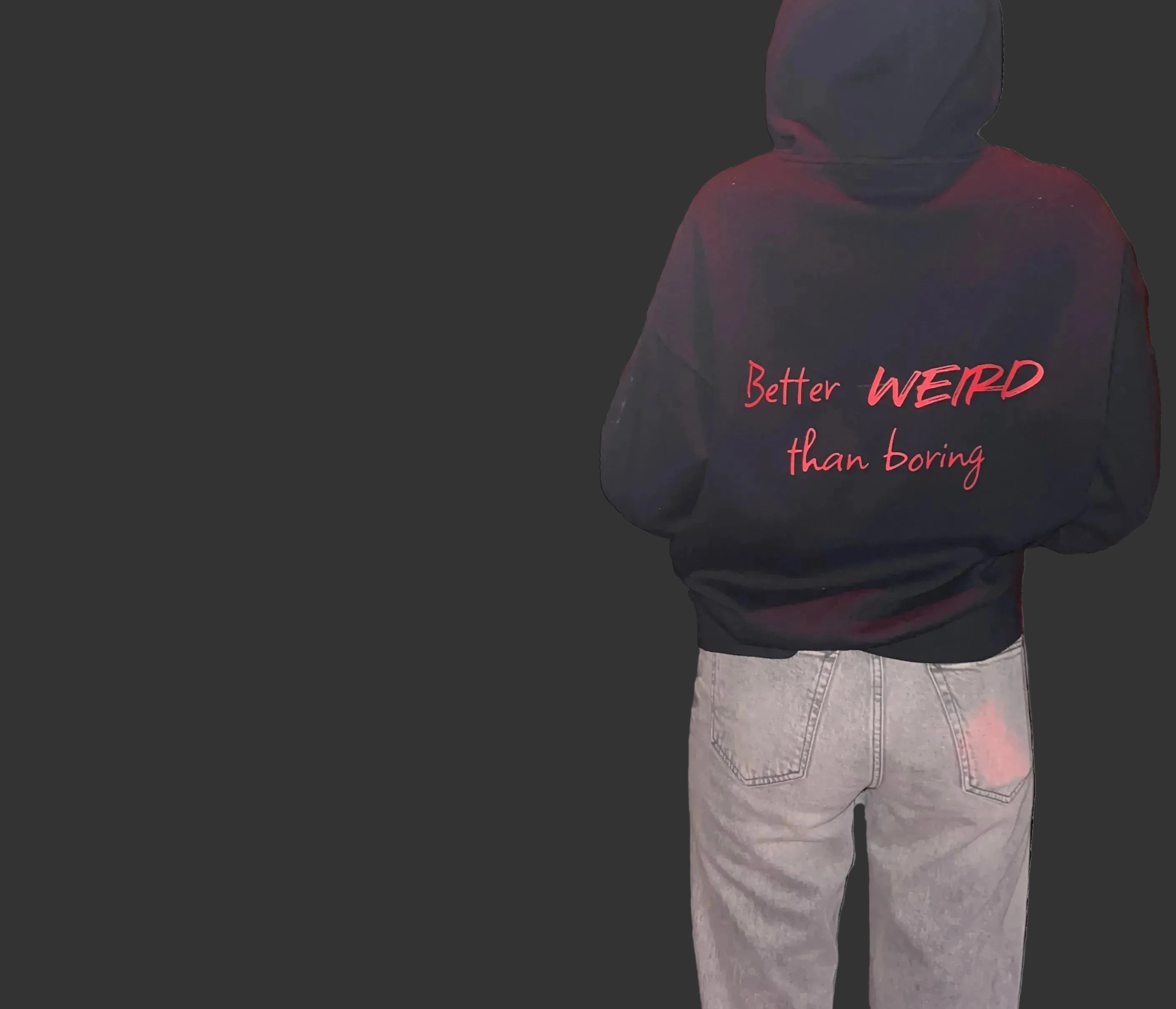 Two people wearing hoodies with 'Better WEIRD than boring' text on a gray background